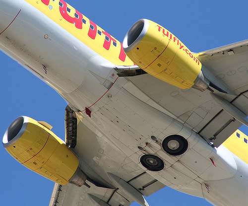 Retracted main landing gear on a Boeing 737 are not enclosed in the fuselage, but are open-air
